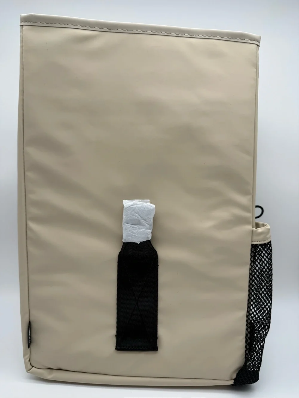 Rains Beige Backpack with Black Handle